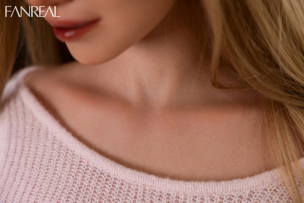 Close-up of Maria ROS in a pink knit neckline