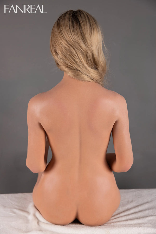 Rear studio view of Lila ROS seated on a covered bench