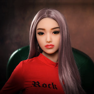 a woman in a red shirt holding a cell phone 